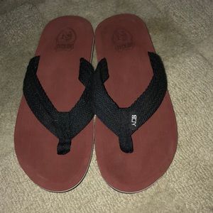 Brown flip flops